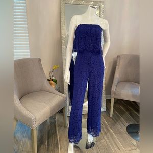 Handmade strapless lace jumpsuit.